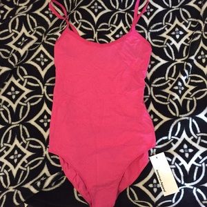 American Apparel Jersey Cotton Bodysuit in Fuchsia